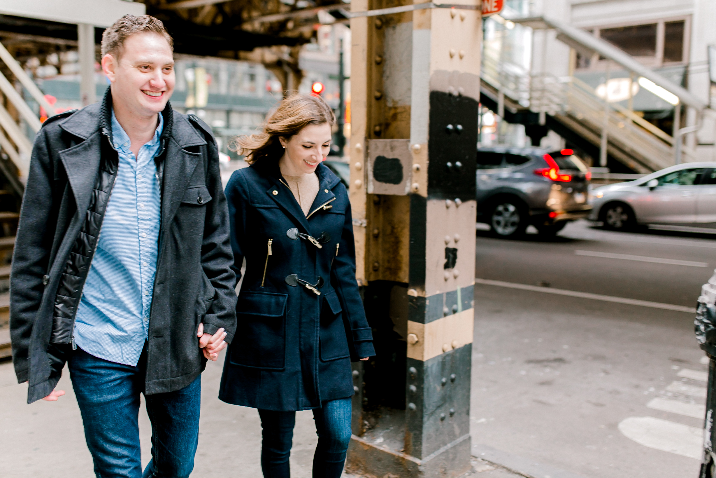 walking among the streets ob Chicago engagement session