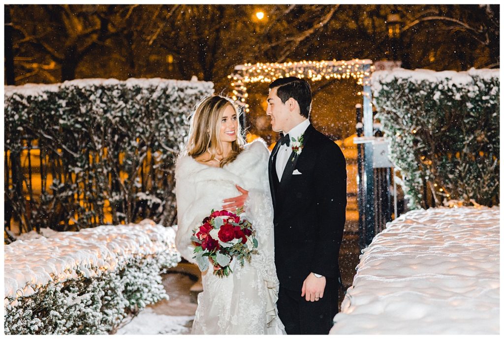 bride and groom walking at snowy night, nowy winter wedding  
