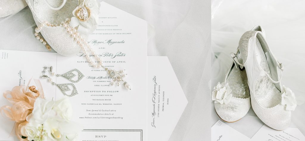 wedding shoes closeup, wedding invitations with jewelry on it
