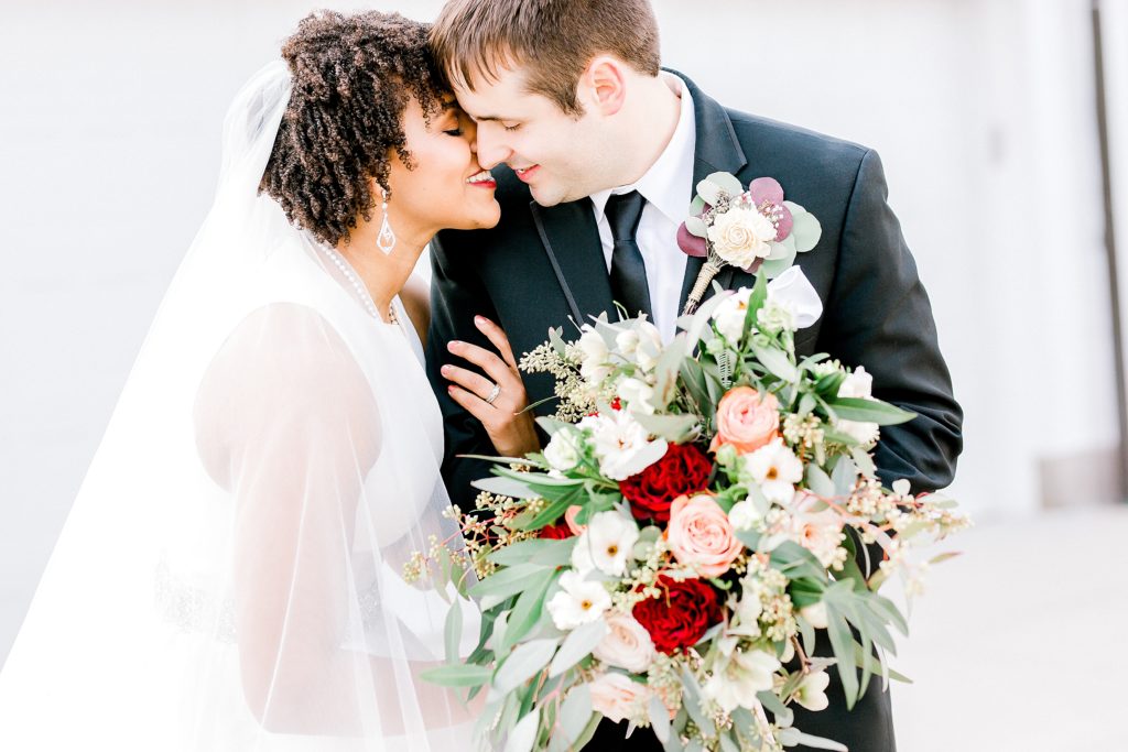 bride and groom kissing