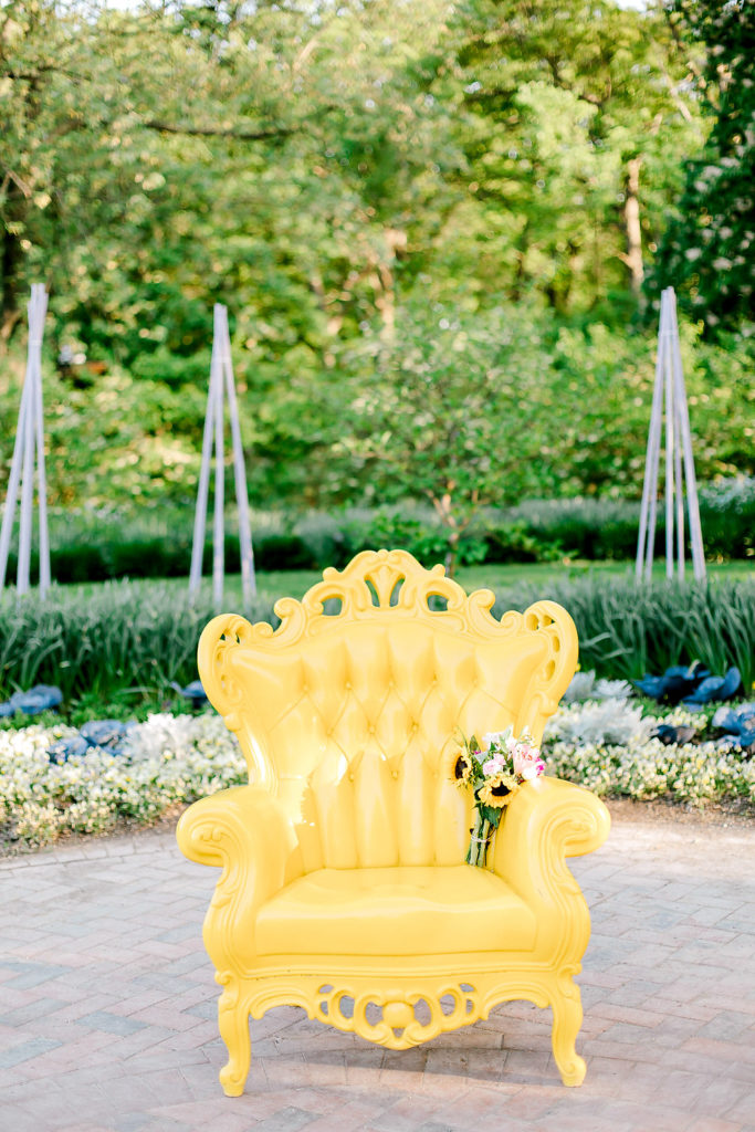 engagement session in summer  yellow chair
