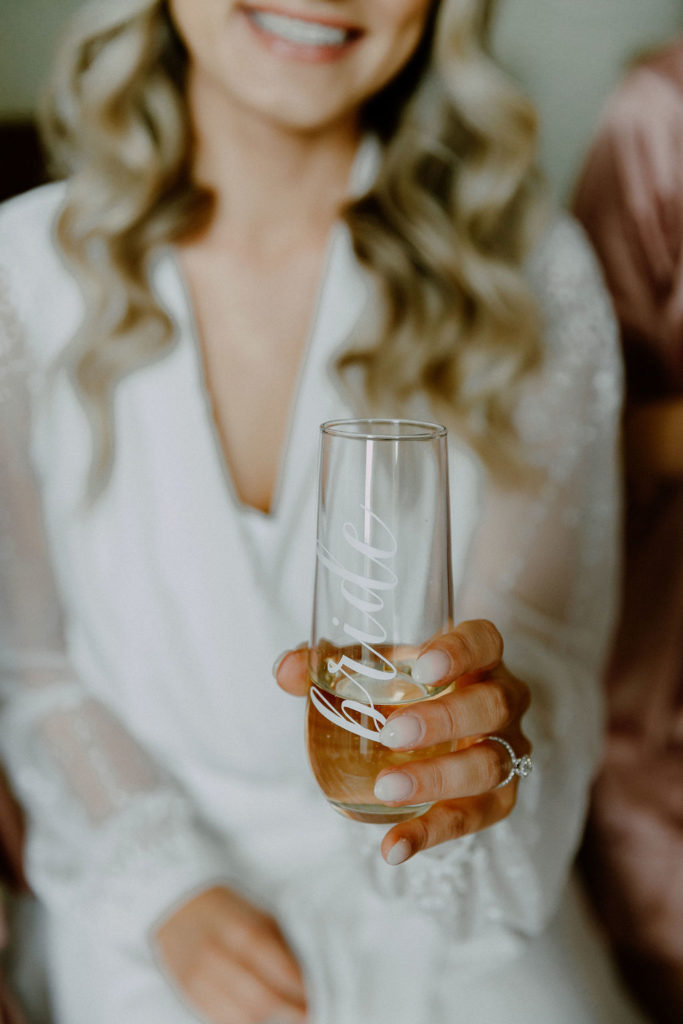 brides toast champagne glass