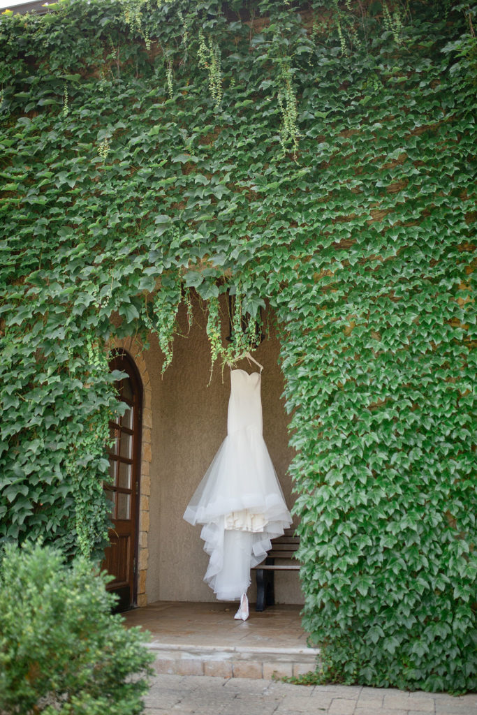 Makray Memorial Club wedding wedding dress on ivy wall