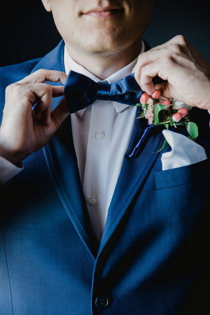 Chicago wedding photographer, groom getting ready, blue suit