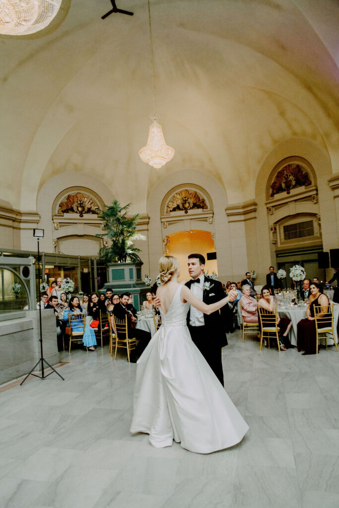 first dance at the wedding in a ballroom
