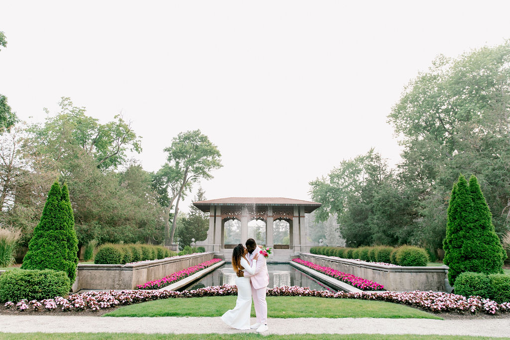 Surrounded by fuchsia accents, the couple's engagement session at Armour House becomes a visual symphony of love and passion.