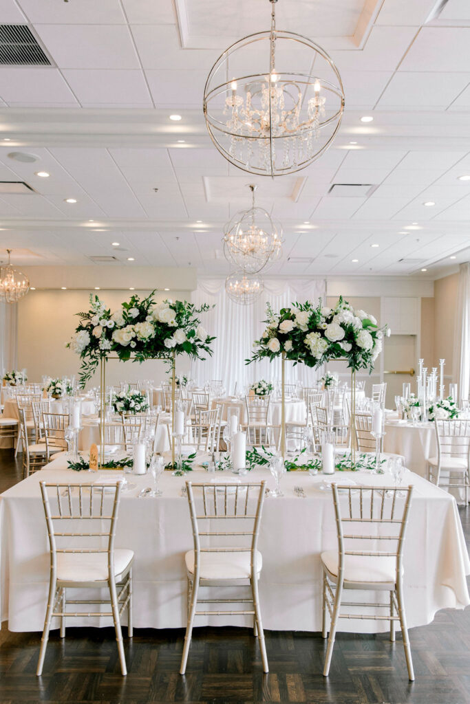 white green and candles wedding reception decor