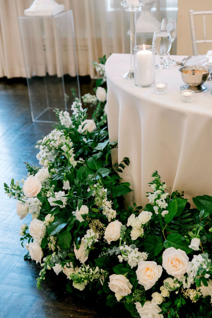 white green and candles wedding reception decor