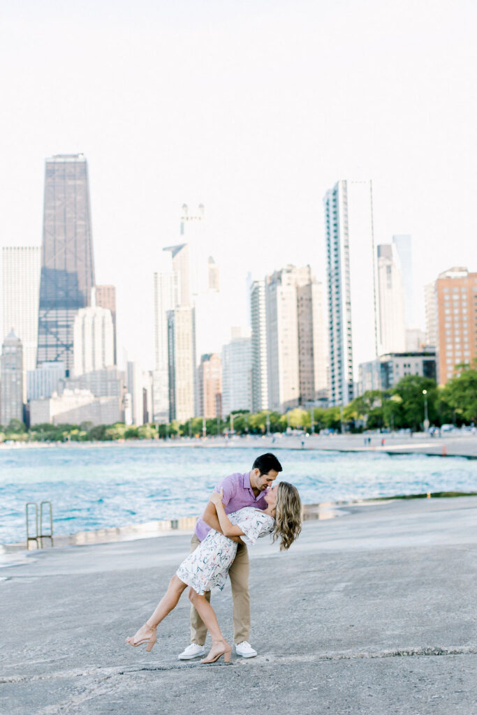 Skyline Splendor: Iconic Chicago landmarks framing the couple's love story, skillfully photographed during their engagement session in Chicago.