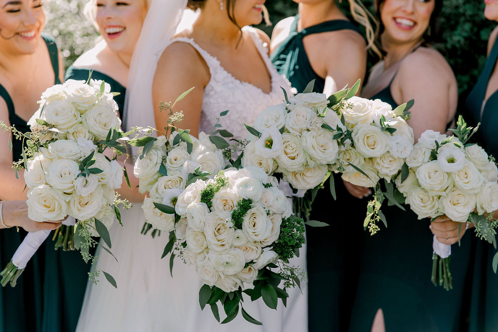 Dominical University bridal party portrait. Emerald green and gold