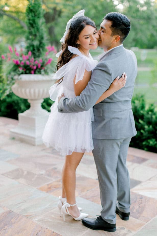 Lush greenery and vibrant blooms framing a serene spot in Cantigny Park, ideal for a Chicago wedding photographer's engagement session.