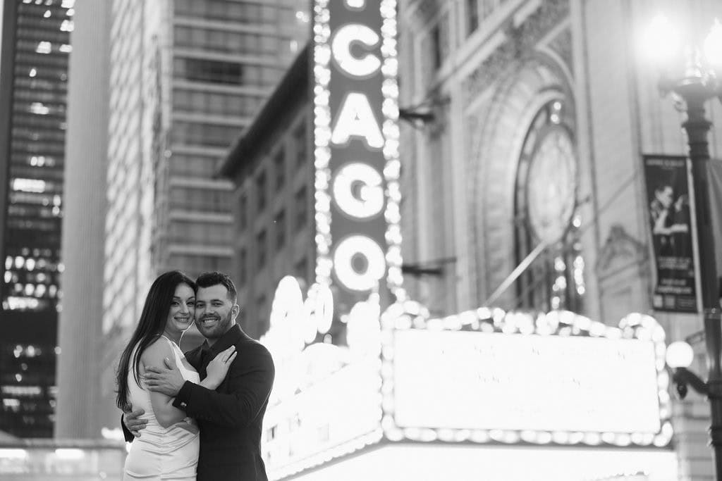 North Ave Beach Engagement Session with Stunning Wrigley Building Backdrop Chicago Theatre engagement session