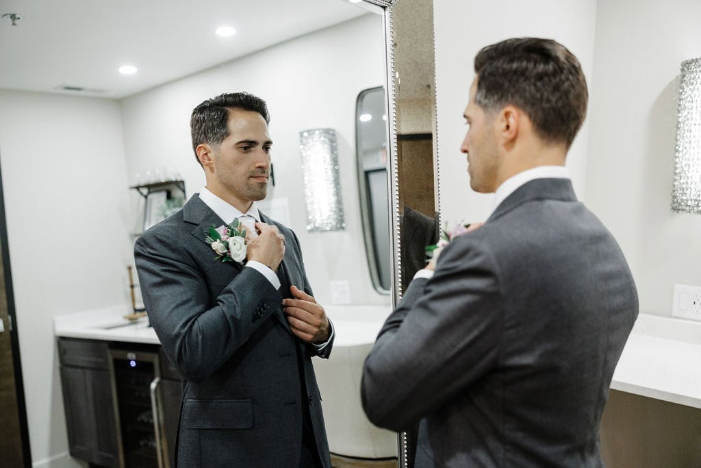 A Romantic Wedding Day at The groom getting ready