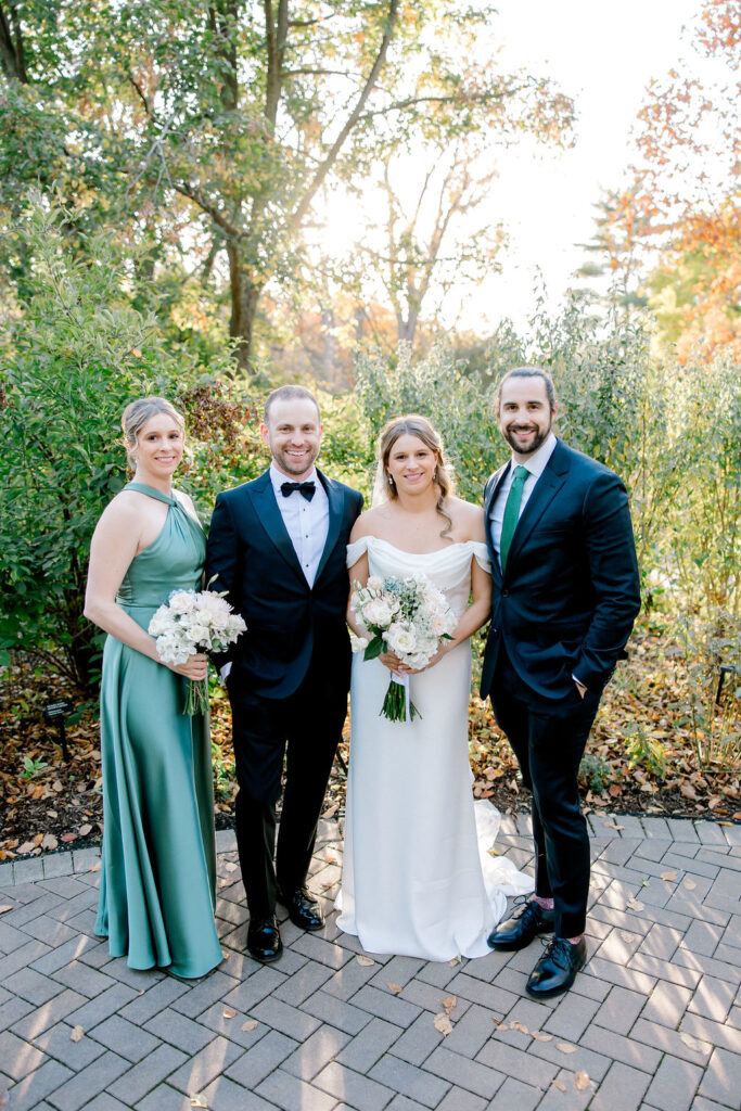 How to Plan Your Wedding Family Photos
Bride and groom with siblings during the family portraits