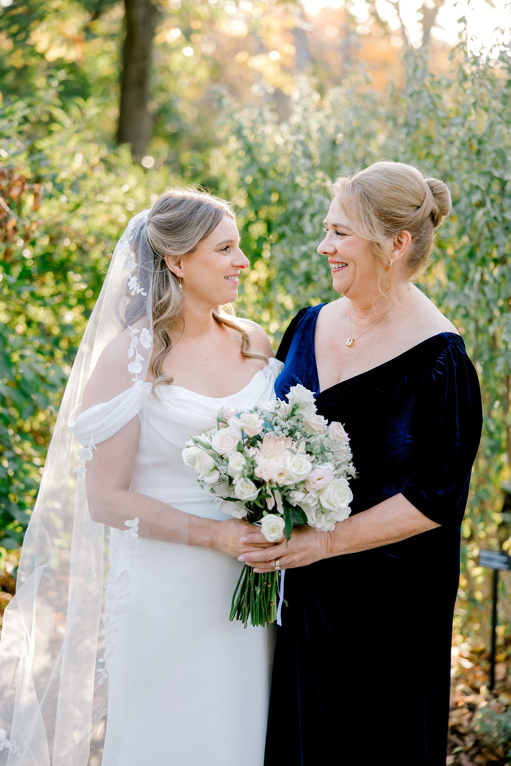 Bride with mom portrait in the garden