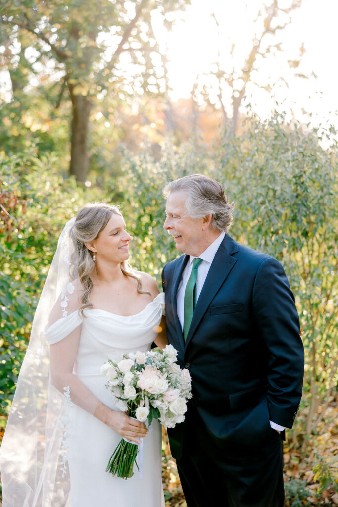 Bride with dad portrait in the garden